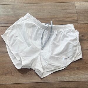 Nike Women’s White Athletic Running Shorts with Silver Logo